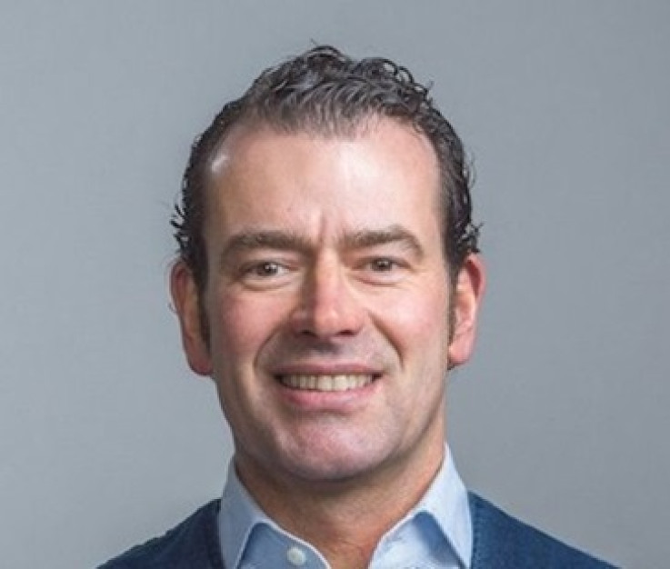 Portretfoto van wethouder Sidney van den Bergh